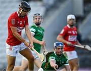 28 July 2021; Padraig Power of Cork shoots under pressure from Chris Thomas of Limerick during the Munster GAA Hurling U20 Championship Final match between Cork and Limerick at Páirc Uí Chaoimh in Cork. Photo by Piaras Ó Mídheach/Sportsfile