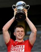 28 July 2021; Cork captain Cormac O'Brien lifts the JJ Kenneally Perpetual Memorial Cup after the Munster GAA Hurling U20 Championship Final match between Cork and Limerick at Páirc Uí Chaoimh in Cork. Photo by Piaras Ó Mídheach/Sportsfile