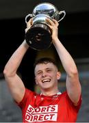 28 July 2021; Cork captain Cormac O'Brien lifts the JJ Kenneally Perpetual Memorial Cup after the Munster GAA Hurling U20 Championship Final match between Cork and Limerick at Páirc Uí Chaoimh in Cork. Photo by Piaras Ó Mídheach/Sportsfile
