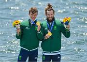 29 July 2021; Fintan McCarthy, left, and Paul O'Donovan of Ireland celebrate with their gold medals after winning the Men's Lightweight Double Sculls final at the Sea Forest Waterway during the 2020 Tokyo Summer Olympic Games in Tokyo, Japan. Photo by Brendan Moran/Sportsfile