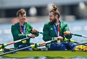 29 July 2021; Fintan McCarthy, left, and Paul O'Donovan of Ireland celebrate with their gold medals after winning the Men's Lightweight Double Sculls final at the Sea Forest Waterway during the 2020 Tokyo Summer Olympic Games in Tokyo, Japan. Photo by Brendan Moran/Sportsfile