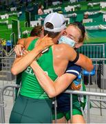 29 July 2021; Fintan McCarthy of Ireland, centre, is congratulated by fellow Irish rowers Aoife Casey, right, and Maragret Cremin after winning the Men's Lightweight Double Sculls final at the Sea Forest Waterway during the 2020 Tokyo Summer Olympic Games in Tokyo, Japan. Photo by Seb Daly/Sportsfile