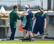 29 July 2021; Fintan McCarthy of Ireland, right, is congratulated by team manager Feargal O'Callaghan after the Men's Lightweight Double Sculls final at the Sea Forest Waterway during the 2020 Tokyo Summer Olympic Games in Tokyo, Japan. Photo by Brendan Moran/Sportsfile