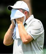 29 July 2021; Shane Lowry of Ireland uses a towel to wipe his face during round 1 of the men's individual stroke play at the Kasumigaseki Country Club during the 2020 Tokyo Summer Olympic Games in Kawagoe, Saitama, Japan. Photo by Stephen McCarthy/Sportsfile