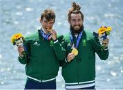 29 July 2021; Fintan McCarthy, left, and Paul O'Donovan of Ireland celebrate with their gold medals after winning the Men's Lightweight Double Sculls final at the Sea Forest Waterway during the 2020 Tokyo Summer Olympic Games in Tokyo, Japan. Photo by Seb Daly/Sportsfile