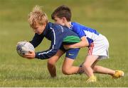 29 July 2021; Charlie Casey, age 8, and Senan Flynn, age 8, in action during the Bank of Ireland Leinster Rugby Summer Camp at Blackrock RFC in Dublin. Photo by Matt Browne/Sportsfile