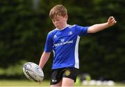 29 July 2021; Conor Brady, age 10, in action during the Bank of Ireland Leinster Rugby Summer Camp at Westmanstown RFC in Dublin. Photo by Matt Browne/Sportsfile
