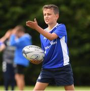 29 July 2021; Conor Dooley, age 9, in action during the Bank of Ireland Leinster Rugby Summer Camp at Westmanstown RFC in Dublin. Photo by Matt Browne/Sportsfile