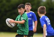 29 July 2021; Naoise Darcy, age 10, in action during the Bank of Ireland Leinster Rugby Summer Camp at Westmanstown RFC in Dublin. Photo by Matt Browne/Sportsfile