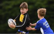 29 July 2021; Ruairi Dowling, age 9, in action during the Bank of Ireland Leinster Rugby Summer Camp at Westmanstown RFC in Dublin. Photo by Matt Browne/Sportsfile