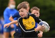 29 July 2021; Ruairi Dowling, age 9, in action during the Bank of Ireland Leinster Rugby Summer Camp at Westmanstown RFC in Dublin. Photo by Matt Browne/Sportsfile