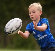 29 July 2021; Marcus McCracken, age 8, in action during the Bank of Ireland Leinster Rugby Summer Camp at Westmanstown RFC in Dublin. Photo by Matt Browne/Sportsfile