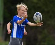 29 July 2021; Josh Wilson, age 8, in action during the Bank of Ireland Leinster Rugby Summer Camp at Westmanstown RFC in Dublin. Photo by Matt Browne/Sportsfile