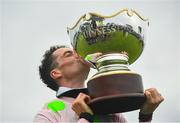 29 July 2021; Jockey Patrick Mullins celebrates with the cup after winning the Guinness Galway Hurdle on Saldier during day four of the Galway Races Summer Festival at Ballybrit Racecourse in Galway. Photo by David Fitzgerald/Sportsfile