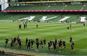 29 July 2021; Bohemians players warm-up before the UEFA Europa Conference League second qualifying round second leg match between Bohemians and F91 Dudelange at the Aviva Stadium in Dublin. Photo by Ben McShane/Sportsfile