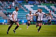 29 July 2021; William Patching of Dundalk, left, celebrates with team-mates after scoring his side's winning goal in injury time during the UEFA Europa Conference League second qualifying round second leg match between Levadia and Dundalk at Lillekula Stadium in Tallinn, Estonia. Photo by Joosep Martinson/Sportsfile