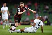 29 July 2021; Andy Lyons of Bohemians is tackled by Jules Diouf of F91 Dudelange during the UEFA Europa Conference League second qualifying round second leg match between Bohemians and F91 Dudelange at the Aviva Stadium in Dublin. Photo by Ben McShane/Sportsfile