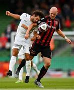 29 July 2021; Georgie Kelly of Bohemians in action against Charles Morren of F91 Dudelange during the UEFA Europa Conference League second qualifying round second leg match between Bohemians and F91 Dudelange at Aviva Stadium in Dublin. Photo by Eóin Noonan/Sportsfile