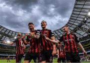 29 July 2021; Rob Cornwall of Bohemians, left, celebrates with team-mates Ciarán Kelly, centre, and Ross Tierney, right after scoring his side's first goal during the UEFA Europa Conference League second qualifying round second leg match between Bohemians and F91 Dudelange at Aviva Stadium in Dublin. Photo by Eóin Noonan/Sportsfile