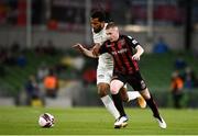 29 July 2021; Ross Tierney of Bohemians in action against Nélito Dos Santos Da Cruz of F91 Dudelange during the UEFA Europa Conference League second qualifying round second leg match between Bohemians and F91 Dudelange at the Aviva Stadium in Dublin. Photo by Ben McShane/Sportsfile