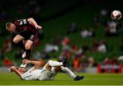 29 July 2021; Ross Tierney of Bohemians comes down on the head on Edvin Muratovic of F91 Dudelange during the UEFA Europa Conference League second qualifying round second leg match between Bohemians and F91 Dudelange at Aviva Stadium in Dublin. Photo by Eóin Noonan/Sportsfile