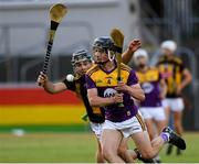 28 July 2021; Robbie Chapman of Wexford in action against Harry Shine of Kilkenny during the 2021 Electric Ireland Leinster Minor Hurling Championship Final match between Kilkenny and Wexford at Netwatch Cullen Park in Carlow. Photo by Matt Browne/Sportsfile