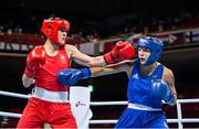 30 July 2021; Kellie Harrington of Ireland, left, and Rebecca Nicoli of Italy during their women's lightweight round of 16 bout at the Kokugikan Arena during the 2020 Tokyo Summer Olympic Games in Tokyo, Japan. Photo by Stephen McCarthy/Sportsfile