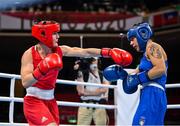 30 July 2021; Kellie Harrington of Ireland, left, and Rebecca Nicoli of Italy during their women's lightweight round of 16 bout at the Kokugikan Arena during the 2020 Tokyo Summer Olympic Games in Tokyo, Japan. Photo by Stephen McCarthy/Sportsfile
