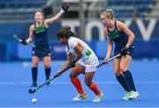 30 July 2021; Neha Neha of India in action against Sarah Hawkshaw of Ireland during the women's pool A group stage match between Ireland and India at the Oi Hockey Stadium during the 2020 Tokyo Summer Olympic Games in Tokyo, Japan. Photo by Ramsey Cardy/Sportsfile