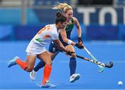 30 July 2021; Nicci Daly of Ireland in action against Udita of India during the women's pool A group stage match between Ireland and India at the Oi Hockey Stadium during the 2020 Tokyo Summer Olympic Games in Tokyo, Japan. Photo by Ramsey Cardy/Sportsfile