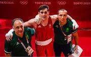 30 July 2021; Aidan Walsh of Ireland with coaches Zaur Antia, left, and Dmitry Dmitruk after defeating Merven Clair of Mauritius in their men's welterweight quarter-final bout at the Kokugikan Arena during the 2020 Tokyo Summer Olympic Games in Tokyo, Japan. Photo by Stephen McCarthy/Sportsfile