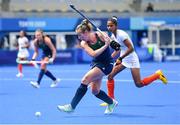 30 July 2021; Sarah Hawkshaw of Ireland in action against Navjot Kaur of India during the women's pool A group stage match between Ireland and India at the Oi Hockey Stadium during the 2020 Tokyo Summer Olympic Games in Tokyo, Japan. Photo by Ramsey Cardy/Sportsfile