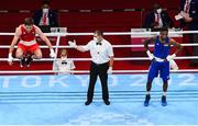 30 July 2021; Aidan Walsh of Ireland is declared victorious over Merven Clair of Mauritius by referee Mansur Muhiddinov following their men's welterweight quarter-final bout at the Kokugikan Arena during the 2020 Tokyo Summer Olympic Games in Tokyo, Japan. Photo by Stephen McCarthy/Sportsfile