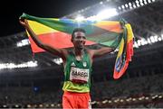 30 July 2021; Selemon Barega of Ethiopia celebrates winning the men's 10000 metres final at the Olympic Stadium during the 2020 Tokyo Summer Olympic Games in Tokyo, Japan. Photo by Ramsey Cardy/Sportsfile