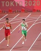 30 July 2021; Cillin Greene of Ireland and Samuel Garcia of Spain in action during the 4x400 metre mixed relay at the Olympic Stadium during the 2020 Tokyo Summer Olympic Games in Tokyo, Japan. Photo by Stephen McCarthy/Sportsfile