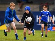 30 July 2021; Simon Hobbs, age 10, in action during the Bank of Ireland Leinster Rugby Summer Camp at Navan RFC in Navan, Meath. Photo by Matt Browne/Sportsfile