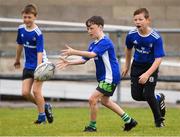 30 July 2021; Sam Friel, age 10, in action during the Bank of Ireland Leinster Rugby Summer Camp at Navan RFC in Navan, Meath. Photo by Matt Browne/Sportsfile