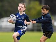 30 July 2021; Connor Greenan, age 9, in action during the Bank of Ireland Leinster Rugby Summer Camp at Navan RFC in Navan, Meath. Photo by Matt Browne/Sportsfile
