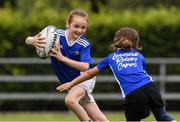 30 July 2021; Olivia Linnane, age 9, and Ella Vasselin, age 8, in action during the Bank of Ireland Leinster Rugby Summer Camp at Navan RFC in Navan, Meath. Photo by Matt Browne/Sportsfile