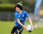 30 July 2021; Robert Wyse, age 11, in action during the Bank of Ireland Leinster Rugby Summer Camp at Navan RFC in Navan, Meath. Photo by Matt Browne/Sportsfile