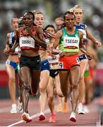 30 July 2021; Gudaf Tsegay of Ethiopia, right, and Hellen Oribi of Kenya lead the field during round 1 of the women's 5000m at the Olympic Stadium during the 2020 Tokyo Summer Olympic Games in Tokyo, Japan. Photo by Ramsey Cardy/Sportsfile