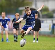 30 July 2021; Connor Greenan, age 9, in action during the Bank of Ireland Leinster Rugby Summer Camp at Navan RFC in Navan, Meath. Photo by Matt Browne/Sportsfile