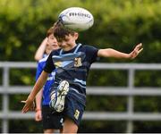 30 July 2021; Casey Reynolds, age 8, in action during the Bank of Ireland Leinster Rugby Summer Camp at Navan RFC in Navan, Meath. Photo by Matt Browne/Sportsfile