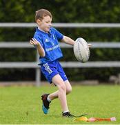 30 July 2021; Tom Greenan, age 6, in action during the Bank of Ireland Leinster Rugby Summer Camp at Navan RFC in Navan, Meath. Photo by Matt Browne/Sportsfile