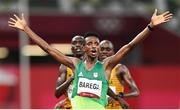 30 July 2021; Selemon Barega of Ethiopia celebrates winning the men's 10,000 metres final at the Olympic Stadium during the 2020 Tokyo Summer Olympic Games in Tokyo, Japan.  Photo by Ramsey Cardy/Sportsfile