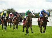 30 July 2021; Hallowed Star, with Jordan Gainford up, second from right, on their way to winning the Adare Manor Opportunity Handicap hurdle alongside Varna Gold, with Jack Gilligan up on day five of the Galway Races Summer Festival at Ballybrit Racecourse in Galway. Photo by David Fitzgerald/Sportsfile