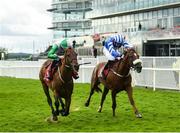 30 July 2021; Hallowed Star, with Jordan Gainford up, left, on their way to winning the Adare Manor Opportunity Handicap hurdle alongside Varna Gold, with Jack Gilligan up on day five of the Galway Races Summer Festival at Ballybrit Racecourse in Galway. Photo by David Fitzgerald/Sportsfile