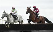 30 July 2021; Battleoverdoyen, with Jack Kennedy up, right, jump alongside Annamix, with Paul Townend up, on their way to winning the Arthur Guinness Steeplechase during day five of the Galway Races Summer Festival at Ballybrit Racecourse in Galway. Photo by David Fitzgerald/Sportsfile