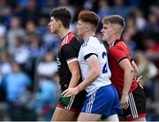 30 July 2021; Seán Jones of Monaghan is marked by Down goalkeeper Charlie Smyth, left, and Ryan Magill of Down during the EirGrid Ulster GAA Football U20 Championship Final match between Down and Monaghan at Athletic Grounds in Armagh. Photo by Piaras Ó Mídheach/Sportsfile