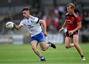 30 July 2021; Shane Hanratty of Monaghan in action against Eamon Brown of Down during the EirGrid Ulster GAA Football U20 Championship Final match between Down and Monaghan at Athletic Grounds in Armagh. Photo by Piaras Ó Mídheach/Sportsfile